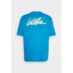 Kobiety T SHIRT TOP | Lacoste LIVE T-shirt z nadrukiem - ibiza/napolitan yellow/niebieski - SJ61982