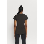 Kobiety T SHIRT TOP | Puma TRAIN FAVORITE TEE - T-shirt basic - black/czarny - EY54549